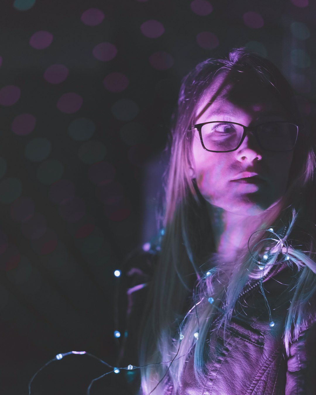 woman wearing black framed eyeglasses