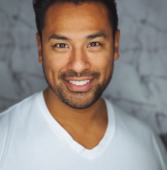 man wearing white V-neck shirt