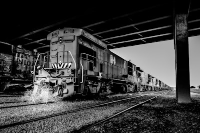 grayscale photography of train on station