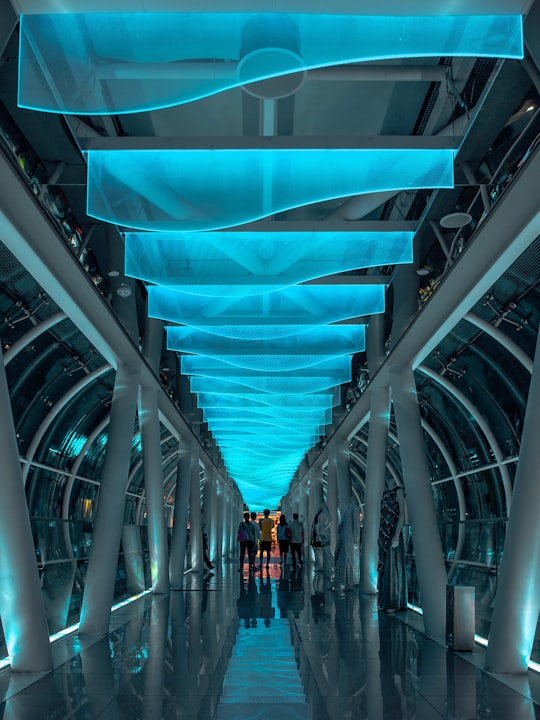 people in middle of hallway in Orchard Road Singapore