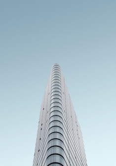 grey glass high-rise building during daytime