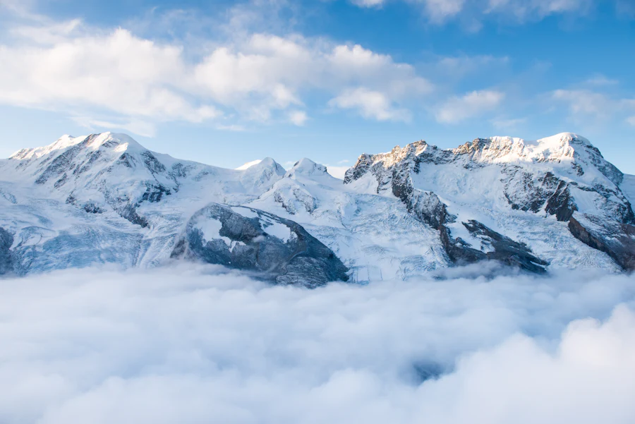 Snow-covered alpine peaks above a mountain village