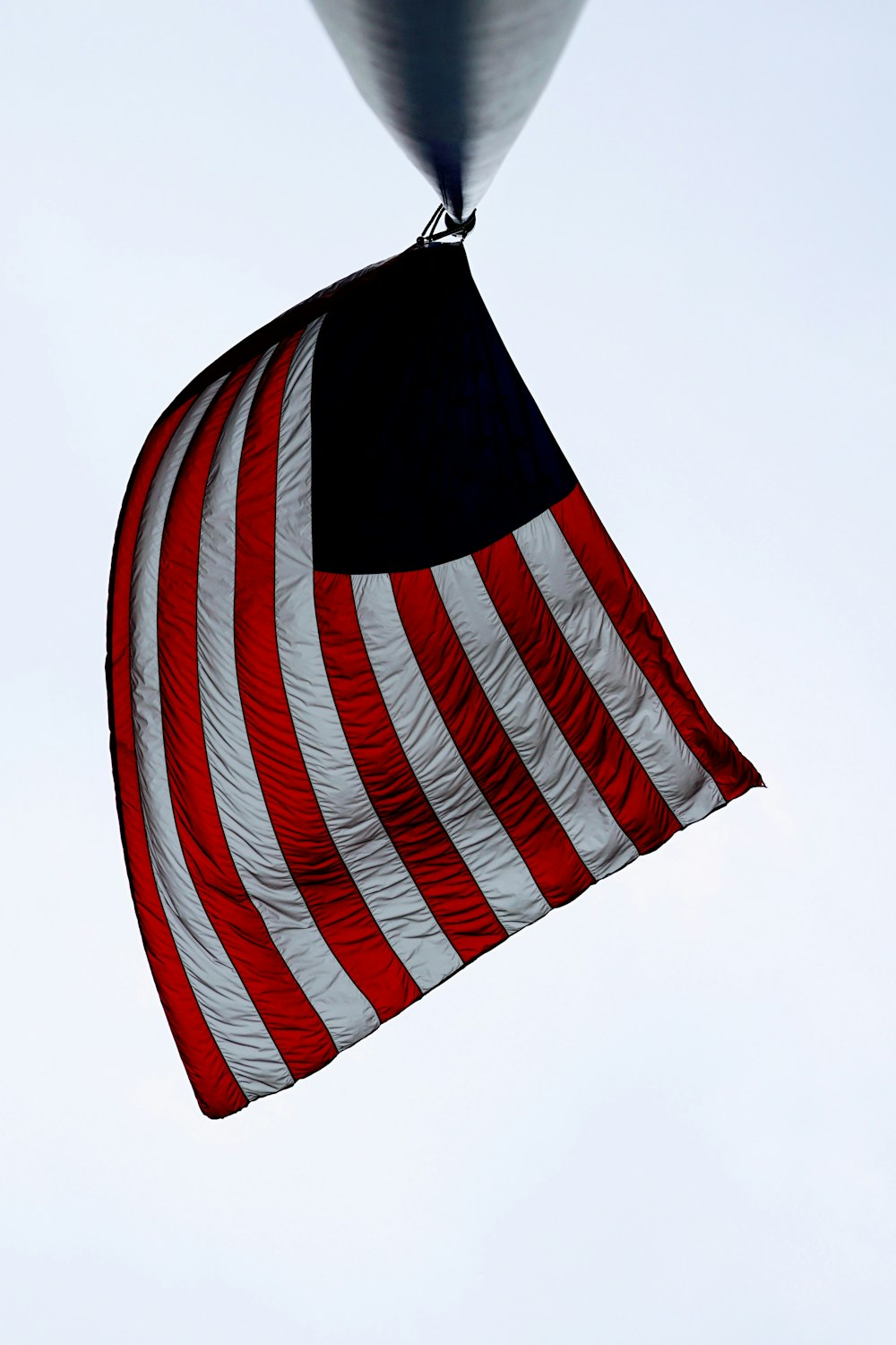 United State of America Flag on black metal post during daytime