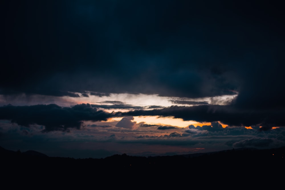 silhouette of mountain and sky