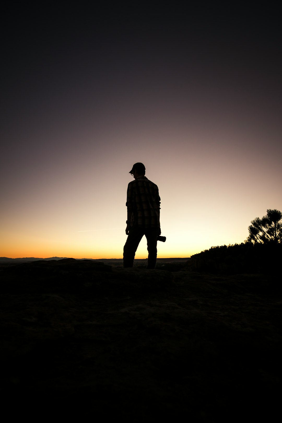 man standing under white and black sky