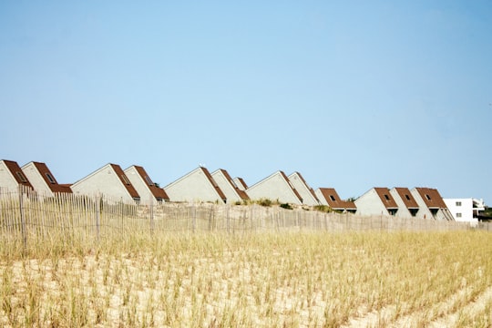 grass field beside brown concrete buildings in Montauk United States