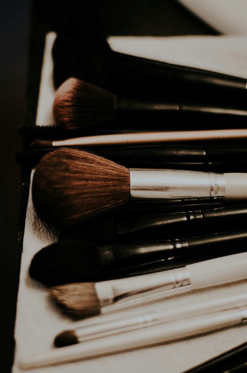 closeup photo of makeup brush set