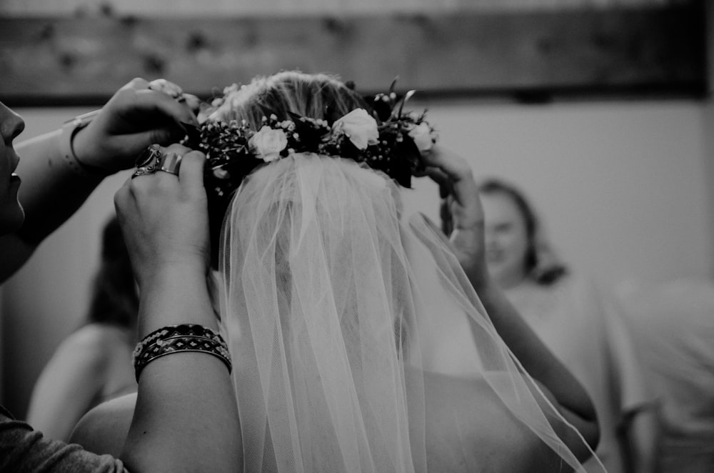 grayscale photo of woman wearing veil