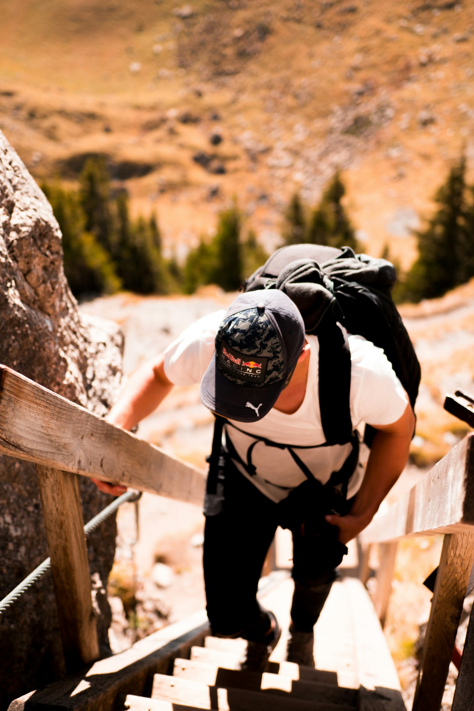 DT 0mm F0 SAM sample photo. Man walking on wooden photography