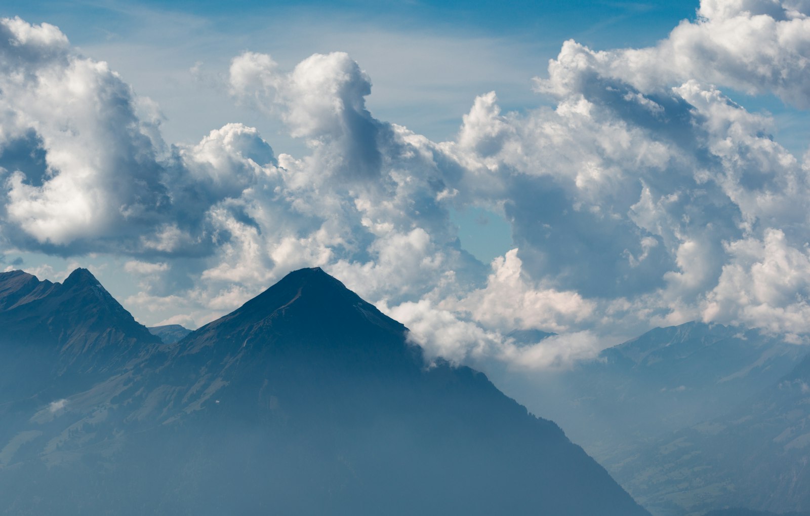 Sigma 150-600mm F5-6.3 DG OS HSM | C sample photo. Mountain landscape with clouds photography