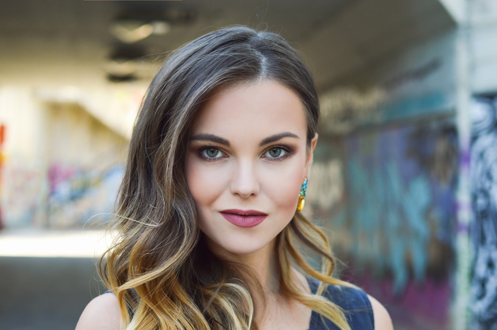 ombre-haired woman taking selfie