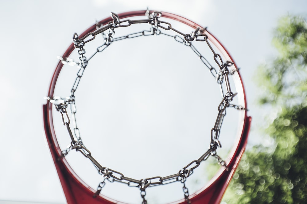 gray and red metal basketball hoop