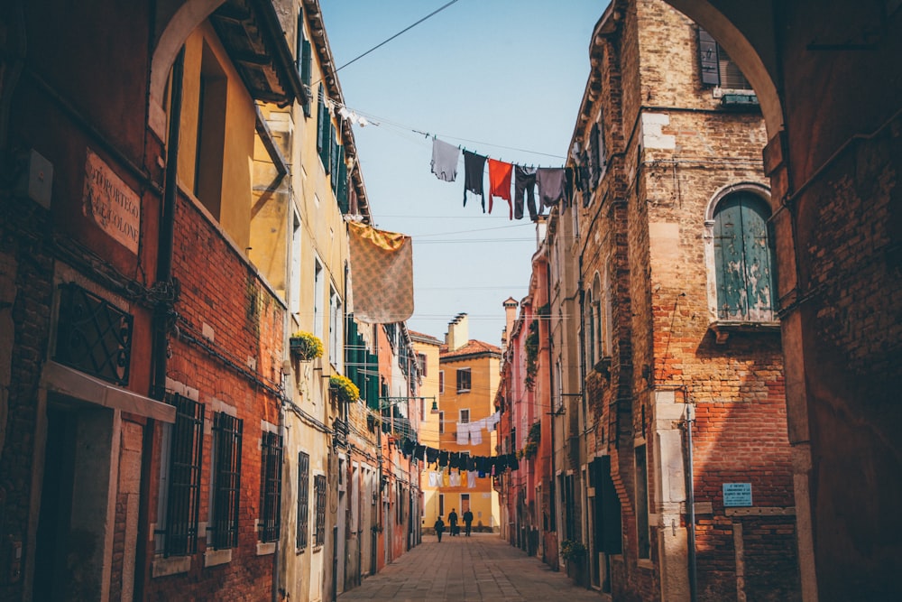 clothes hanged across empty alley