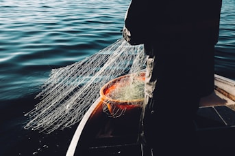 man holding a fishnet
