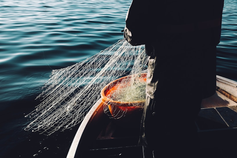 man holding a fishnet