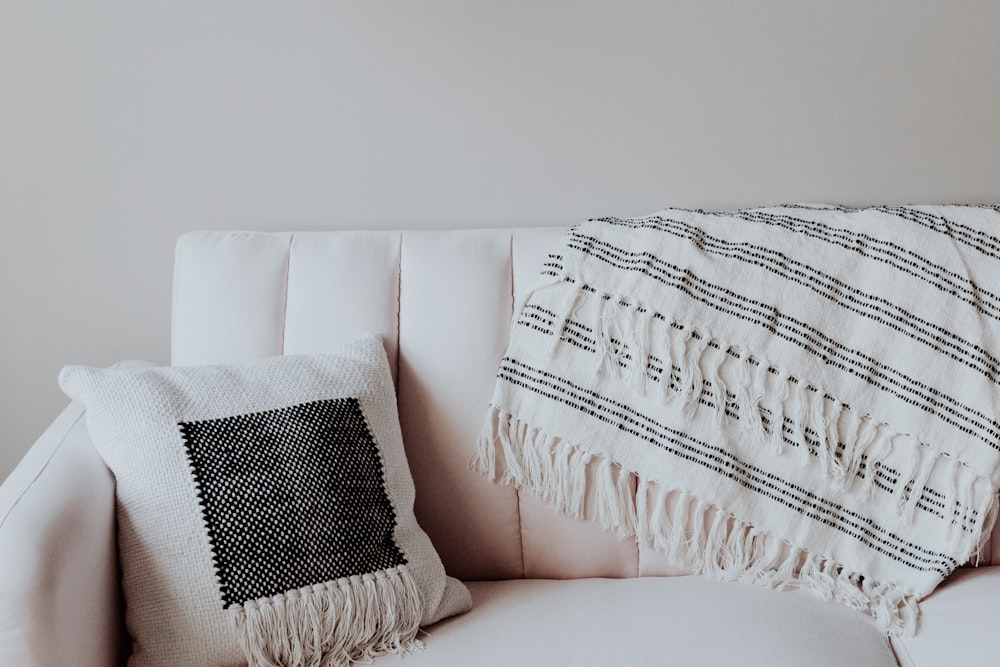 white and black throw pillow