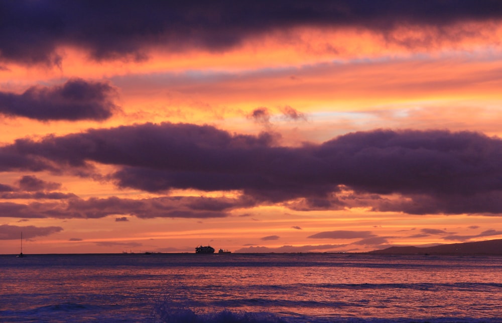 large body of water at golden hour