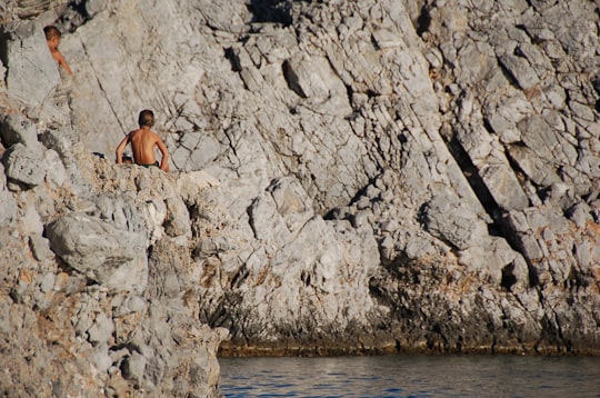 photo of Lindos Rock climbing near Acropolis of Rhodes