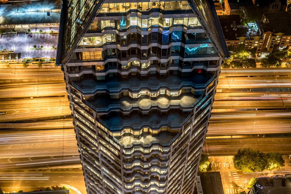 photo of illuminated high-rise building