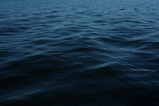 body of water during daytime in Apostle Islands National Lakeshore United States