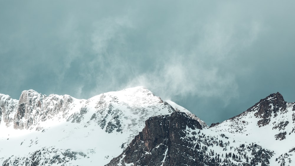 gray mountain covered with snow