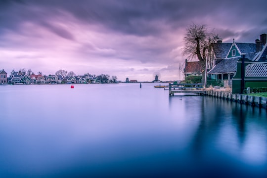 body of water in the middle of city in Zaanse Schans Netherlands