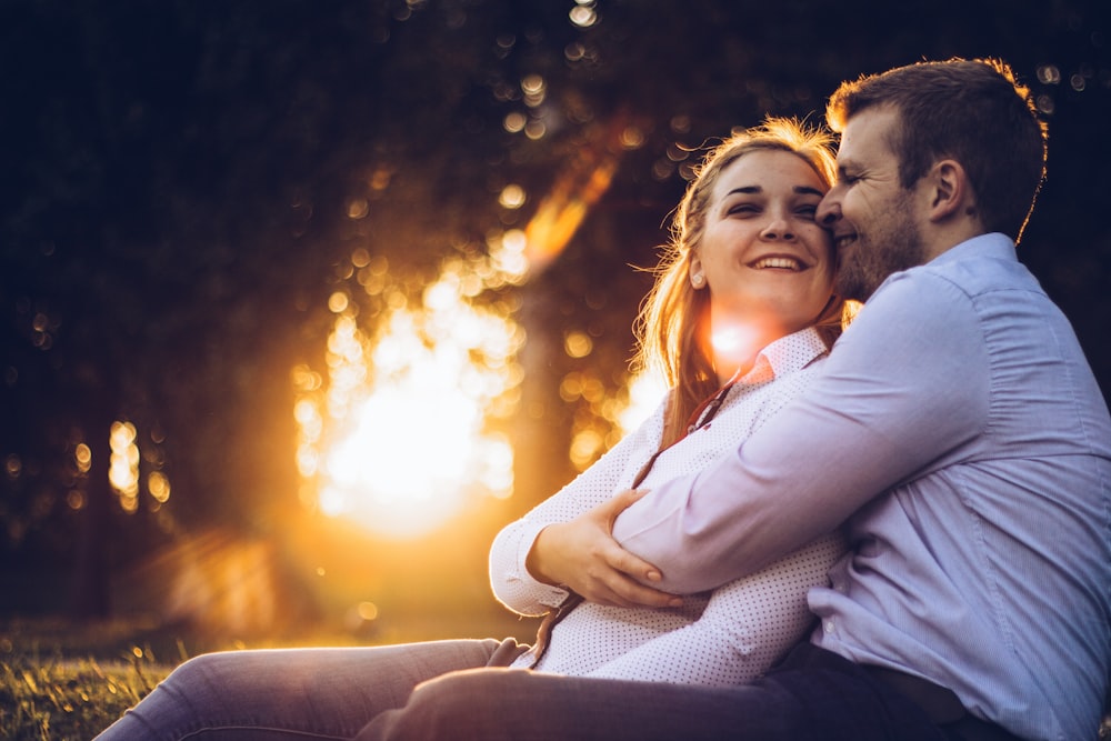 man hugging a woman