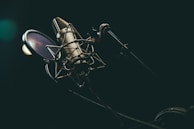 bokeh photography of condenser microphone