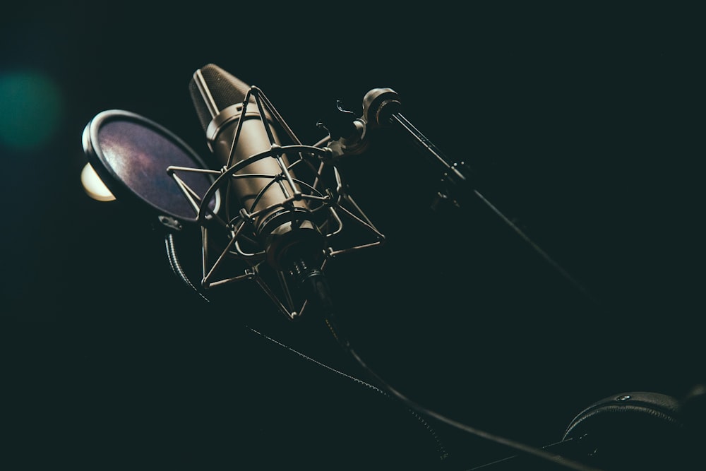 bokeh photography of condenser microphone