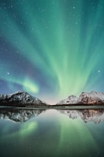 landscape photo of mountains near lake wallpaper