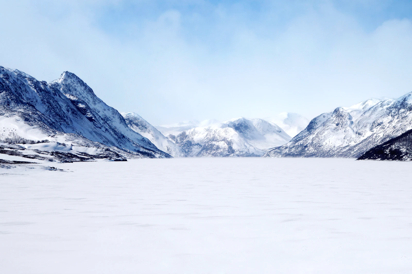 Snowy mountains above a Patagonian lake in winter
