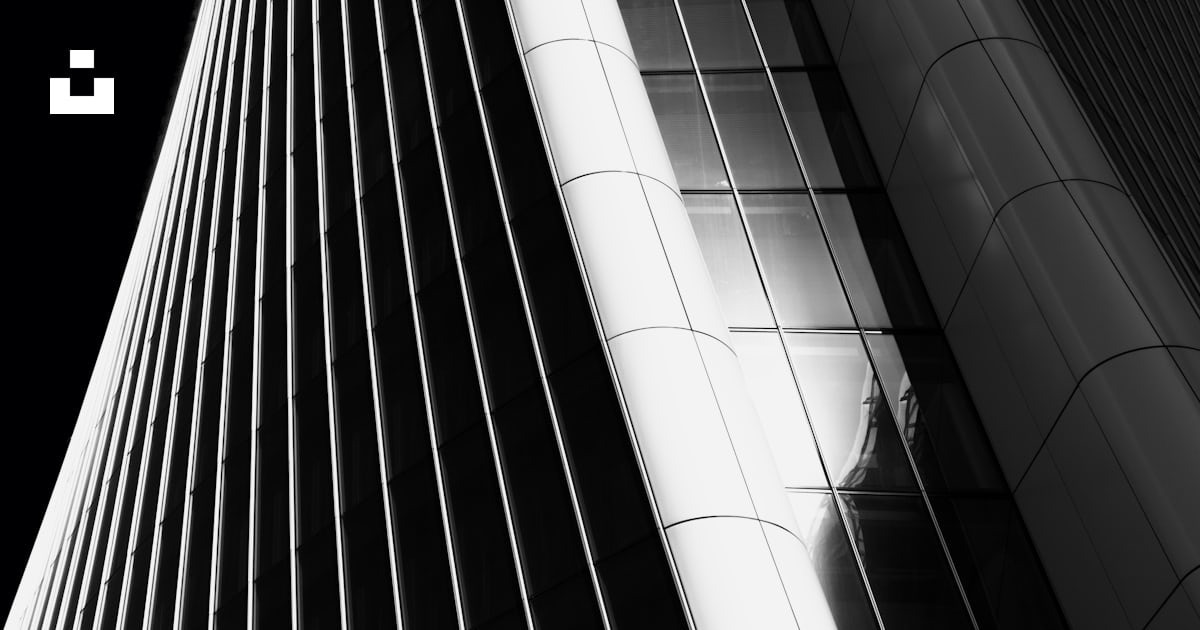 High-rise curtained wall building grayscale photography photo – Free ...