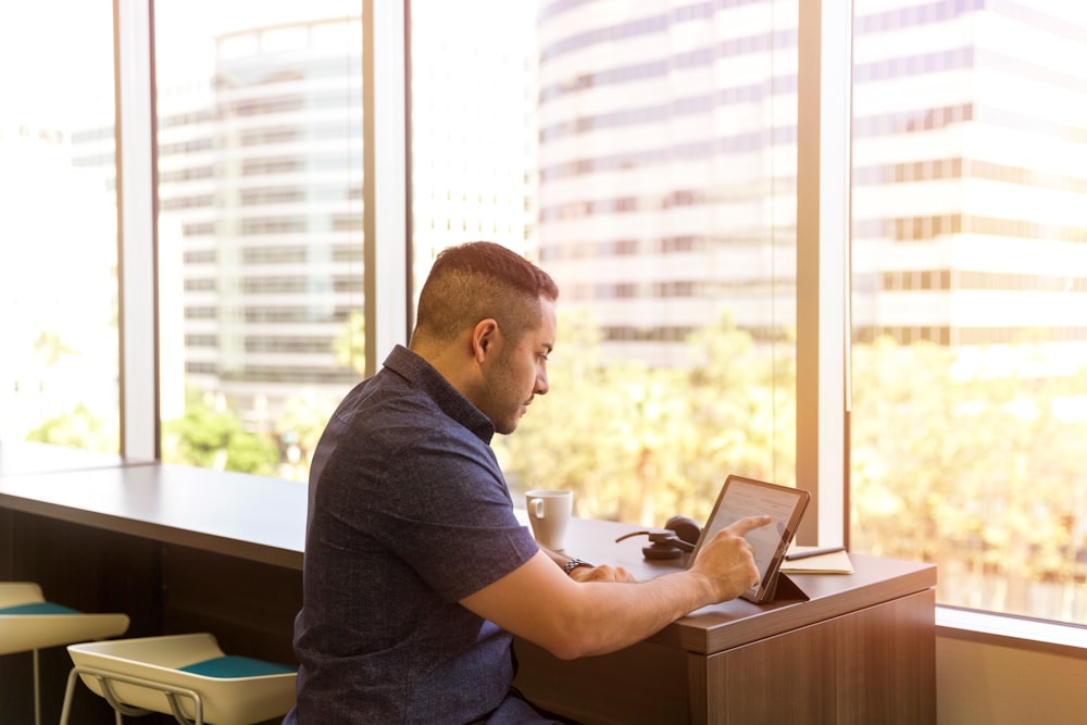 man using tablet computer