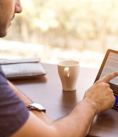 man holding tablet computer