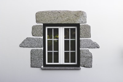 Close-up of a double-pane window replacement showcasing clean white frames.