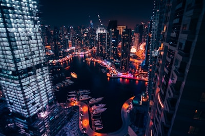 aerial view of high rise buildings during night time
