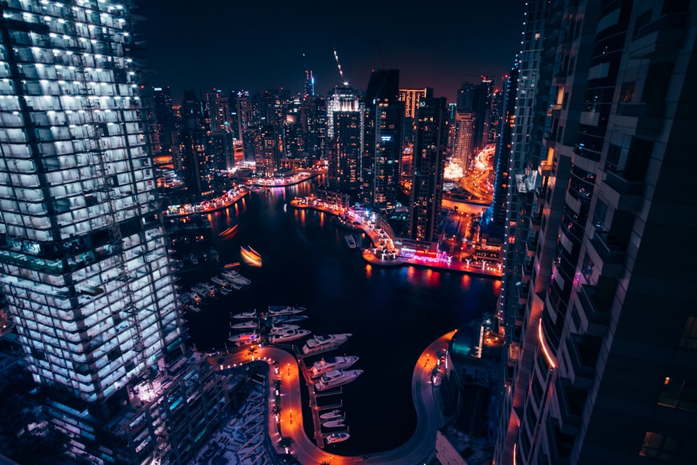 aerial view of high rise buildings during night time