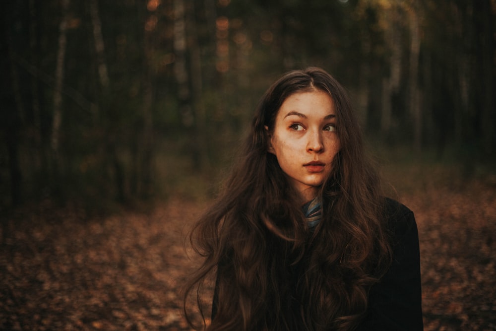 woman standing taking selfie