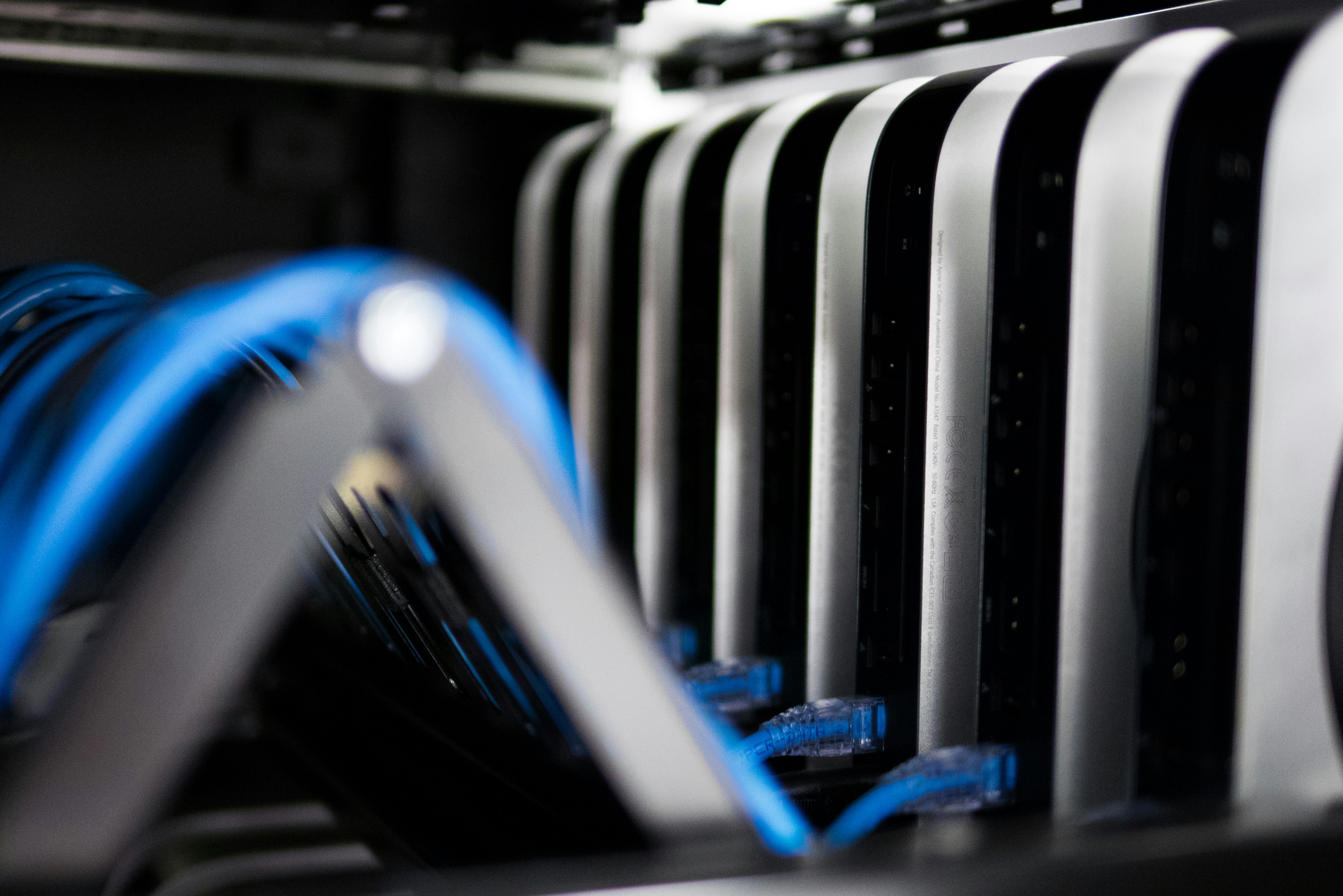 server racks with glowing blue lights in modern data center