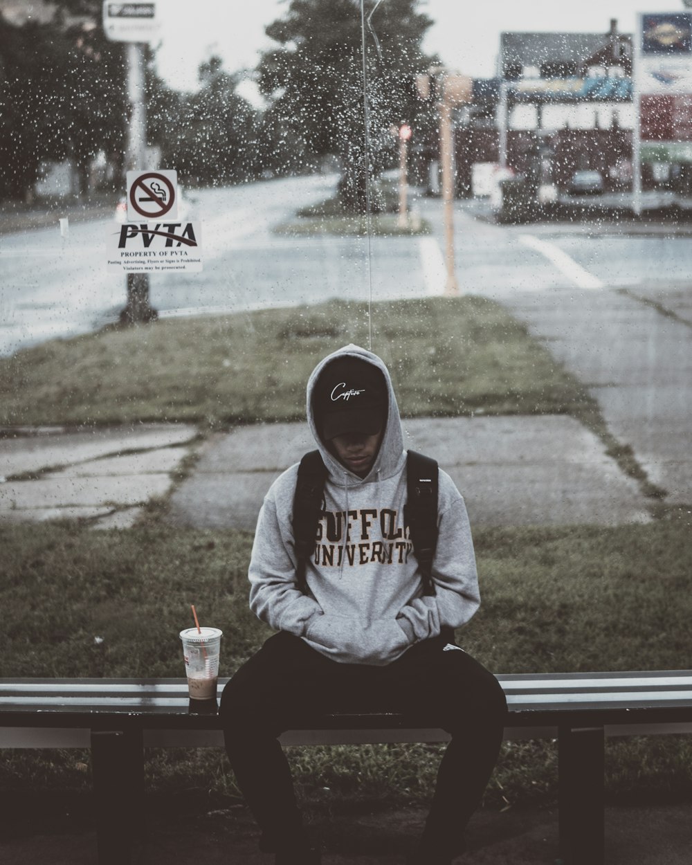 man sitting on bench