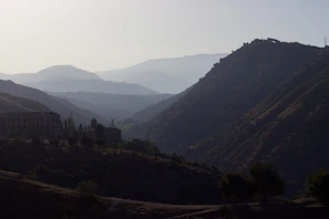 Surveying scene with distant landscape features rendered clearly, no blur or pixelation