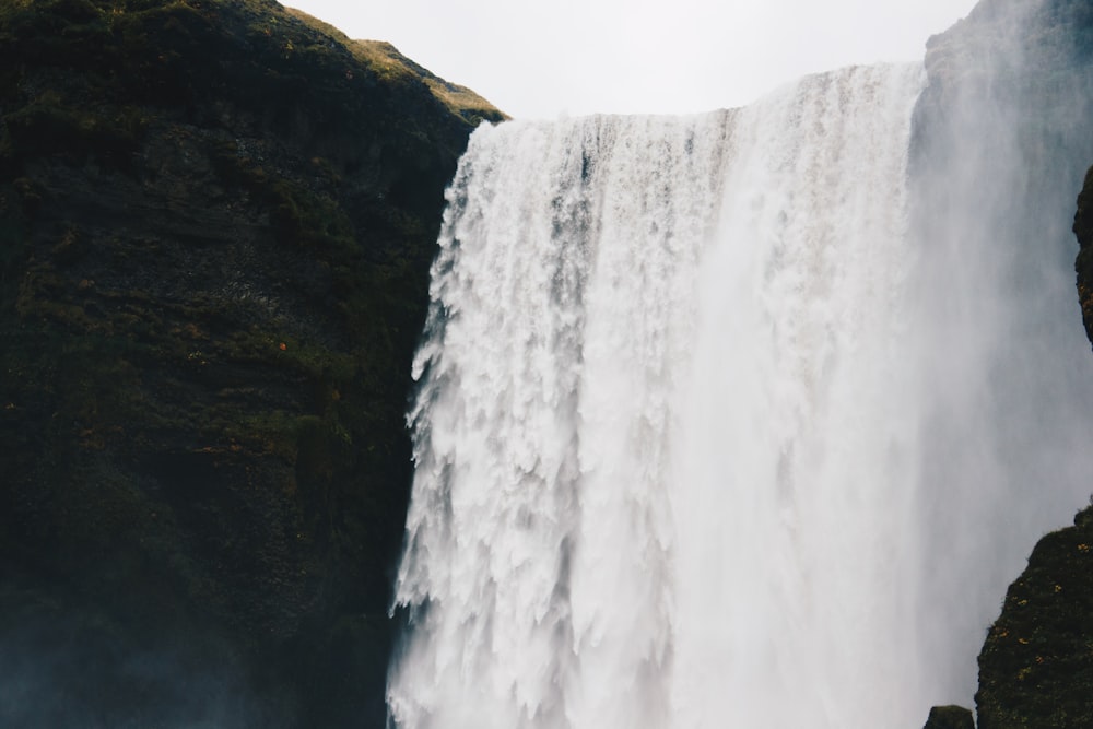 Skogafoss waterfalls low-angle photography at daytime