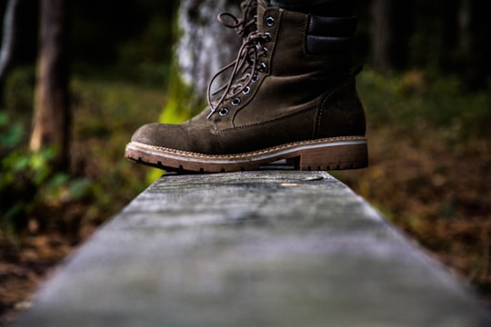 low angle photo of pair of brown suede work boots in Kartena Lithuania