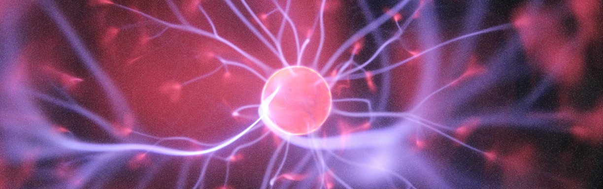 purple and pink plasma ball