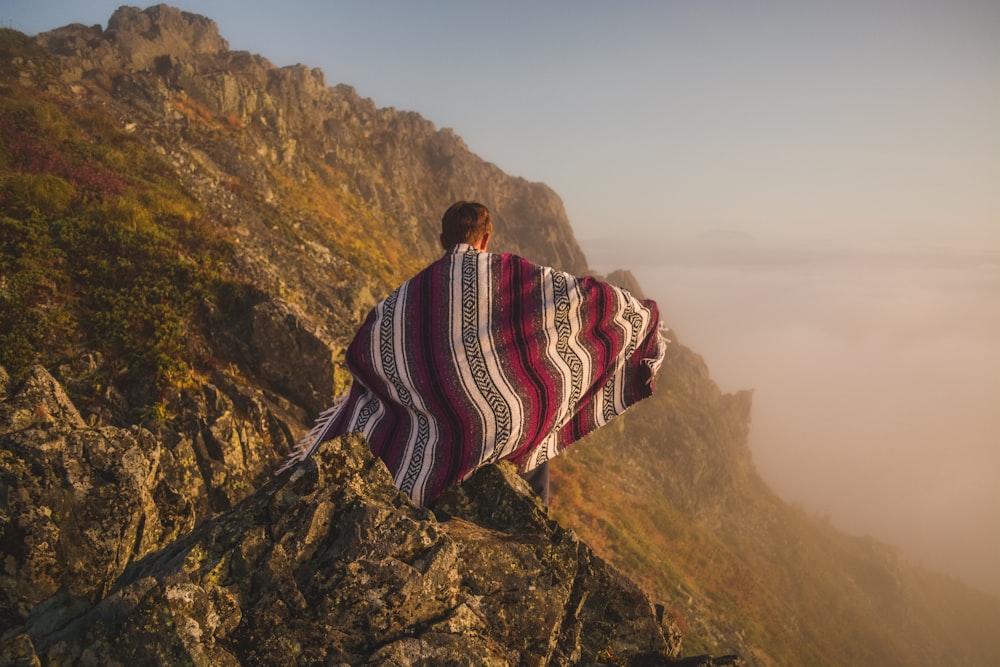 person on top of mountain