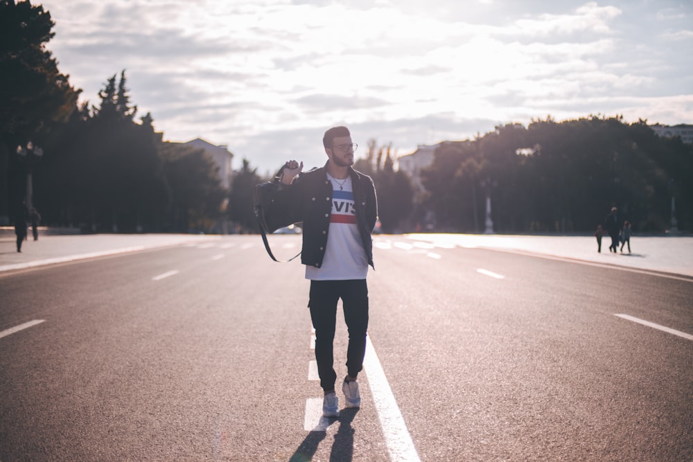 man walking on street