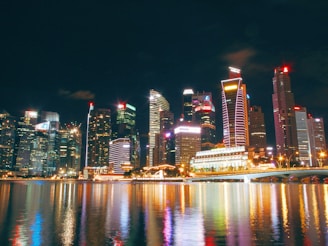 A vibrant city skyline at night, showcasing urban travel destinations.