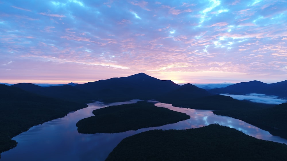 landscape photography of mountains and lake