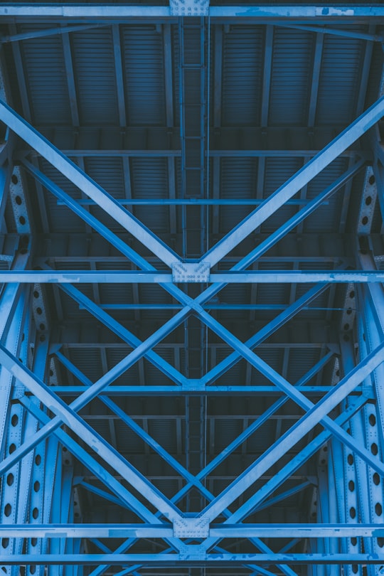 low-angle photography of grey metal beams and roof in Cleveland United States