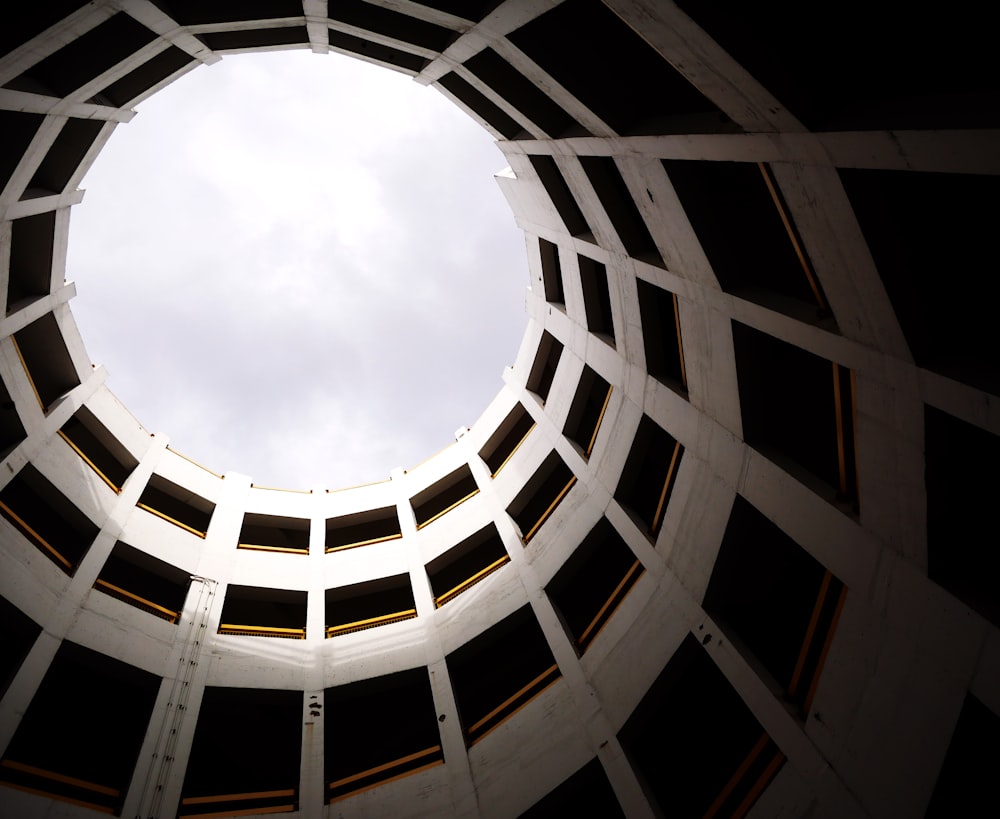 low angle photography of white concrete building